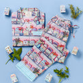 Colorful fabric with house pattern on a blue background